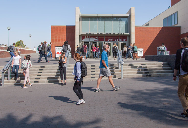 Students walk by the CUB