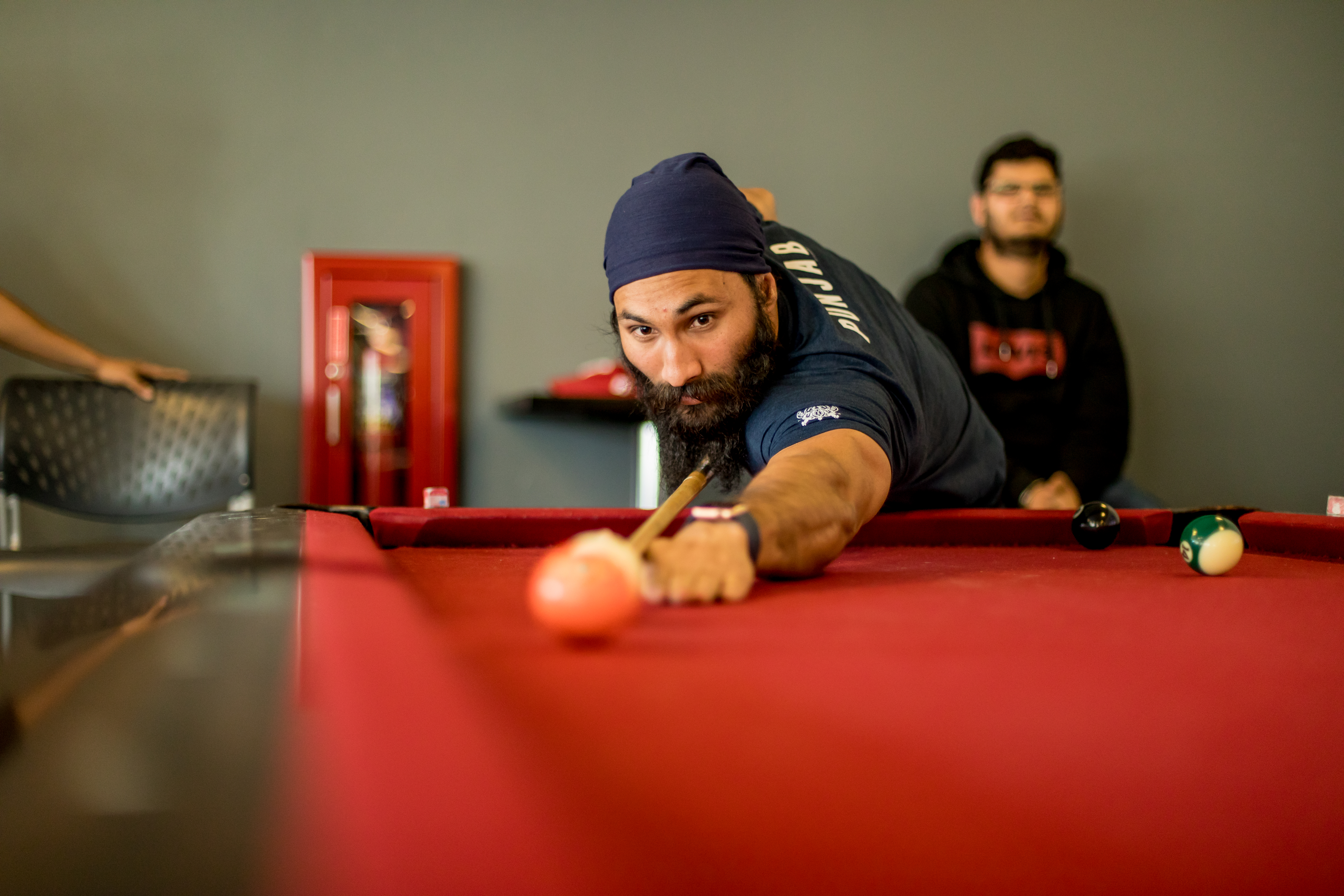 Students playing pool